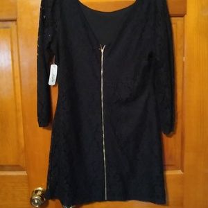 Little black dress with gold zipper in the back
